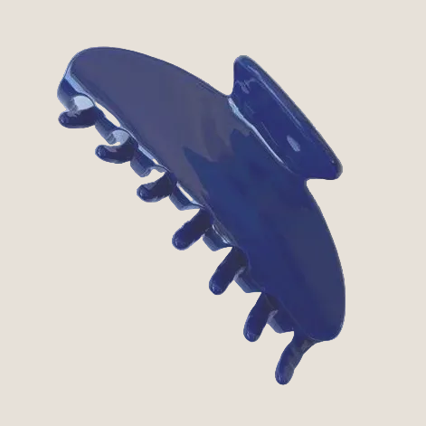 Blue hair clip on a white background